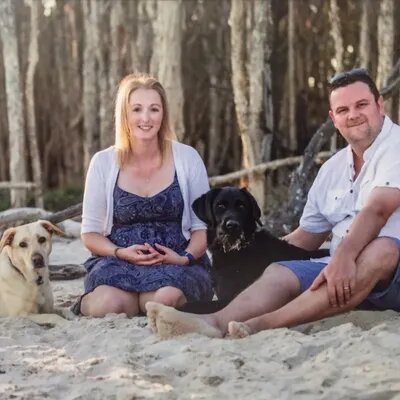Lisa Reynolds, her hersband Jamie and her two dogs, Darcy and Buddy.